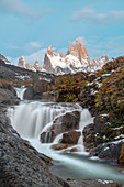 Secret waterfall and Fitz Roy at sunrise, El Chalten, Los Glaciares National Park, UNESCO World Heritage Site, Santa Cruz province, Argentina, South America