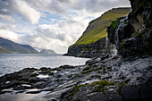 View from the seal woman of Mikladalur to the south to the islands Kunoy and Bordoy, Mikladalur, Kalsoy, Faroe Islands, Denmark.