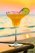 Margharita cocktail (tequila, triple sec and lime) at sunset, Otres Beach, Sihanoukville, Cambodia, Indochina, Southeast Asia, Asia