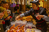 Street food in Kuanxiangzi Alley, Chengdu, Sichuan Province, People's Republic of China, Asia