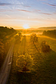 Sunrise at the wooden meadows near Dornheim, Iphofen, Kitzingen, Lower Franconia, Franconia, Bavaria, Germany, Europe