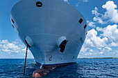 Bow of the passenger cargo ship Aranui 5 (Aranui Cruises) in the roadstead in front of Avatoru Island, Rangiroa Atoll, Tuamotu Islands, French Polynesia, South Pacific