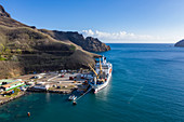 Aerial view of passenger freighter Aranui 5 (Aranui Cruises) at pier, Taiohae, Nuku Hiva, Marquesas Islands, French Polynesia, South Pacific