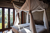 Bedroom in a residence villa accommodation on a hill at Six Senses Fiji Resort, Malolo Island, Mamanuca Group, Fiji Islands, South Pacific