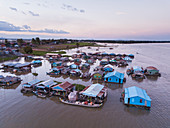 Aerial view of Kampong Prasat floating village on Tonle Sap River at dusk, Kampong Prasat, Kampong Chhnang, Cambodia, Asia