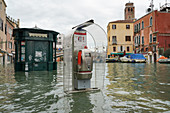High tide in Venice in November 2019, newsstand and telephone booth at Ponte delle Guglie, Venice, UNESCO World Heritage Site, Veneto, Italy, Europe