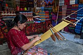 Woman weaving cloth, Antigua, Guatemala.
