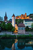 The Tauber flows gently past the old town with the Roter Turm am Faultor (Kittsteintor), collegiate church and Wertheim Castle at dusk, Wertheim, Spessart-Mainland, Franconia, Baden-Wuerttemberg, Germany, Europe