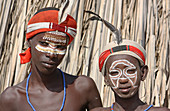 Ethiopia; Southern Nations Region; southern Ethiopian highlands; two boys of the Arbore people; with with headdress and face painting; Arbore tribal area between Turmi and the village of Arbore