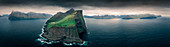 Panorama of the cliffs of Kalsoy island in sunset, Faroe Islands