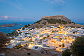 Night view over Lindos town, Rhodes, Dodecanese, Greek Islands, Greece, Europe