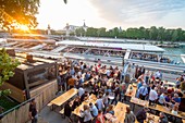 France, Paris, area listed as World Heritage by UNESCO, the New Pedestrian Berges at the Champs Elysees Port, the barge bar restaurant the Rosa Bonheur, the Alexandre III bridge