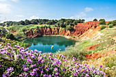 Italy, Apulia, Salento region, surroundings of Otranto, former bauxite quarry with an emerald green lake