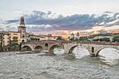 View of the Ponte Pietra over the Adige River in Verona, Italy.