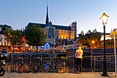 France, Somme, Amiens, Saint-Leu district, Quai Belu on the banks of the Somme river and Notre-Dame cathedral, jewel of the Gothic art, listed as World Heritage by UNESCO