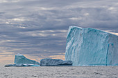 Huge icebergs at Cape Brewster, the easternmost point of the jagged and mountainous Savoia Peninsula, Greenland, Polar Regions