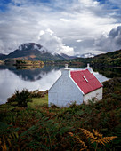 Red roofed cottage at Loch Shieldaig, Wester Ross, Scotland, United Kingdom, Europe