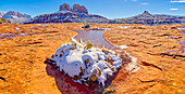 Snow covered Cathedral Rock in Sedona viewed from a sandstone plateau along Secret Slick Rock Trail, Arizona, United States of America, North America