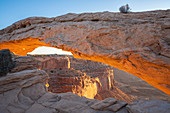 Glowing arch at Mesa Arch, Canyonlands National Park, Utah, United States of America, North America