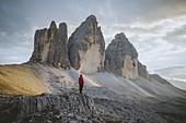 Italy,South Tirol,Sexten Dolomites,Tre Cime di Lavaredo,Man looking at rock formations