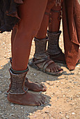 Angola; in the southern part of Namibe Province; Muhimba women's foot jewelry; wide silver rings around the ankles