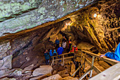 Guided tour of the Grønligrotte cave, south of the Svartisen glacier, Norway