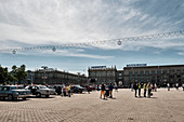 View across Kastryčnickaja plošča (Kastrycnickaja Square) in Minsk Belarus during a vintage car show.
