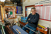 Home weaving, tweed weaver Donald John Mackay, Isle of Harris, loom, cottage, Outer Hebrides, Scotland UK