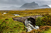 Quinag mountain range, old stone bridge in the Scottish Highlands, military bridge, Sutherland, Scotland UK
