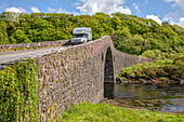 Campervan, motorhome, four wheel drive bimobile, Clachan Bridge, Seil Island, Scotland UK