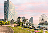 Yokohama skyline and lake promenade at Nippon Maru Memorial Park, Yokohama, Kanagawa, Japan