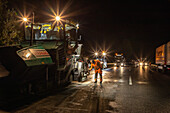 Night construction site A2, Hanover, express redevelopment, construction workers during roadway redevelopment, rutting removal, German autobahn,