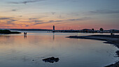 Sunset in Podersdorf am Neusiedler See with a view of the lighthouse in Podersdorf, Burgenland, Austria.