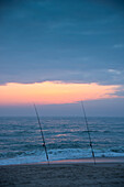 Fishing rods in the evening mood on the North Sea