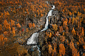Waterfall in Stora Sjöfallet National Park in autumn in Lapland in Sweden from above