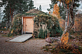 Hut with moss in Stora Sjöfallet National Park in Lapland in Sweden