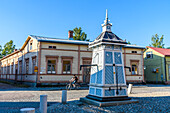 Old fountain with wooden paneling, street scenes in the old town of Rauma, west coast, Finland