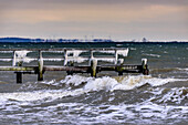 Icy old wooden pier on the beach, Travemünde, Bay of Lübeck, Schleswig Holstein, Germany