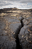 Crack in volcanic rock, Pali Aike Volcanic Field National Park, Patagonia, Santa Cruz Province, Chile, South America
