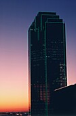 Bank of America Building lit up at dusk, Dallas, Texas, USA