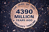 A marker notes the age of the Grand Canyon.