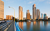 Looking across the Chevron Bridge leading towards Surfers paradise and high rise apartments with traffic heading both ways
