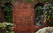 Old red brick wall and arched window recesses at Fort Santiago - Philippines