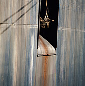 Close up of ship's anchor secured in Hawsehole in hull of the Ship