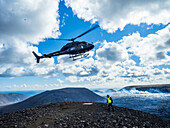 Helicopter lifting off from Observation Hill, Volcanic eruption at Geldingadalir, Iceland