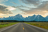 Driving road in Wyoming overlooking Tetons