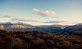 Snow capped Southern Alps in late afternoon light - New Zealand