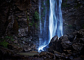 Water falling onto rocks at the base of Queen Mary Falls - Queensland