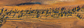 High angle aerial view of dry arid landscape from central South Australia. Aerial images over the Painted Desert, Dry Creek Beds, and scrub bushland