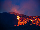 Glowing lava at twilight, Fagradalsfjall Volcano from Observation Hill, Iceland